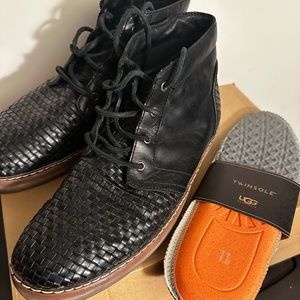 Men’s black leather UGG boots.